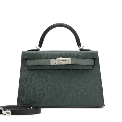 Muted Forest Green Contrast Handle Compact Rectangular Hand Bag With Sleek Silvery Twist Lock Hardware And Fine Defined Grain Detailing