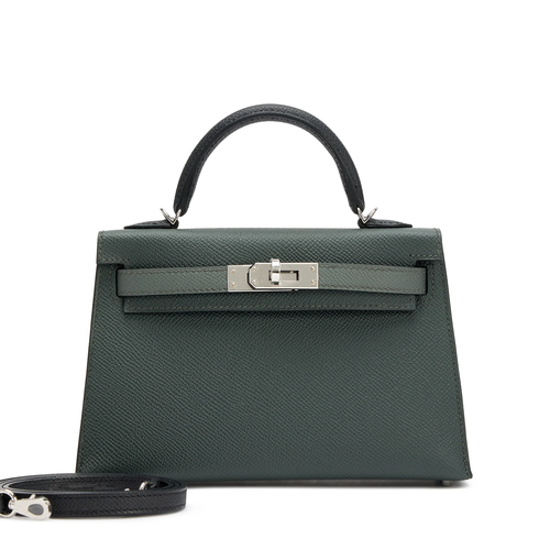 Muted Forest Green Contrast Handle Compact Rectangular Hand Bag With Sleek Silvery Twist Lock Hardware And Fine Defined Grain Detailing